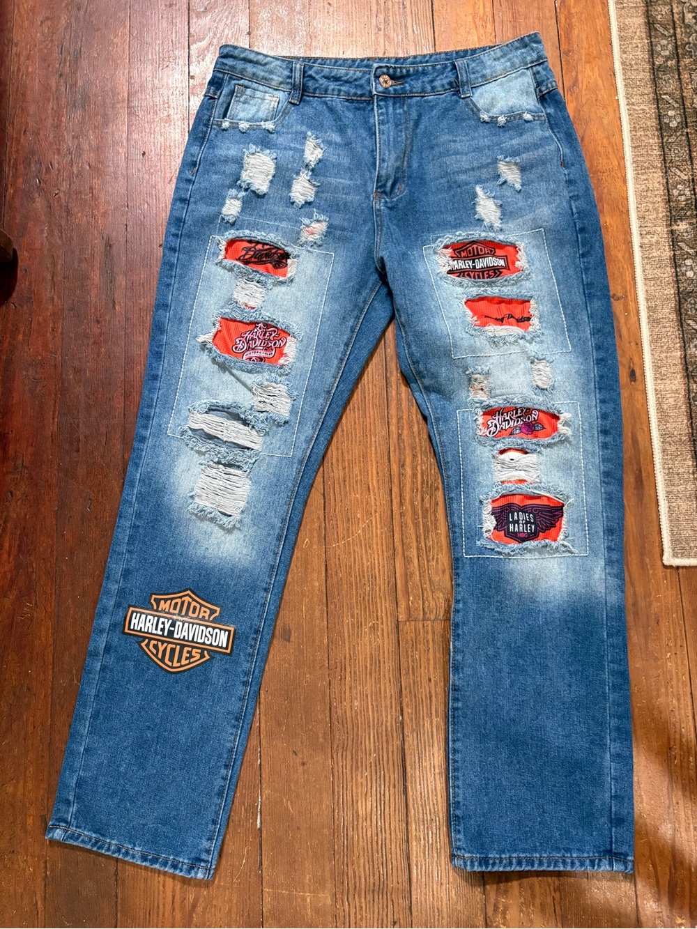 Harley-Davidson women’s Blue Denim Straight Jeans with Orange Patch Accents
